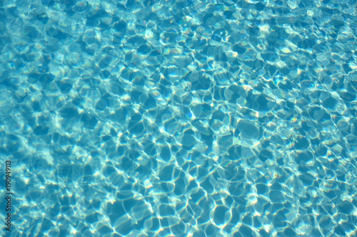 Swimming pool water surface abstract background photo