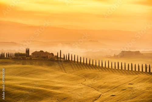 Tuscany - Landscape sunrise view, hills farm and meadow, Toscana - Italy