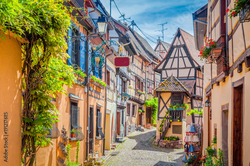 Charming street scene in old medieval village in Europe in summer