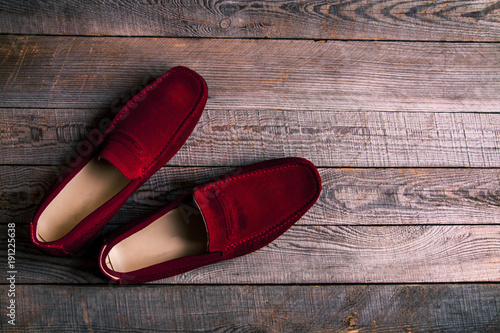 Men's Loafer Shoe on old wood background