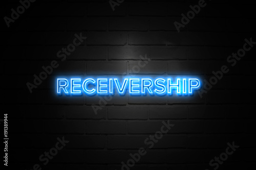 Receivership neon Sign on brickwall