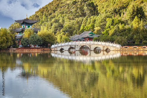 Suocui Bridge in the Jade Spring Park in Lijiang Old Town, China. 
