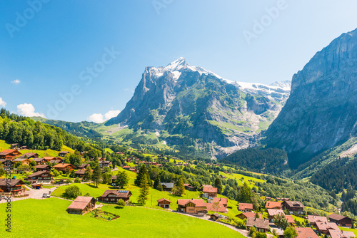 Village of Grindelwald. Grindelwald is a village in the Interlaken Oberhasli district in the canton of Berne in Switzerland. Arial view