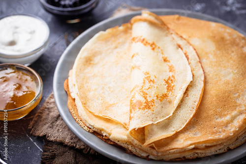 Pancakes crepes with different jam and cream