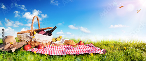 Picnic - Basket With Bread And Wine On Meadow 