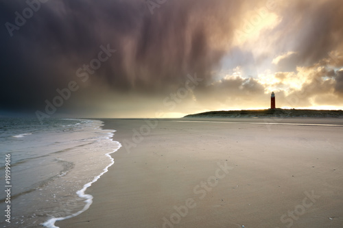 dramatic stormy sunrise on North sea coast
