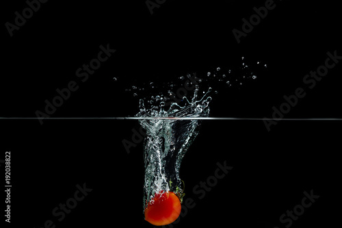 tomato in water splash