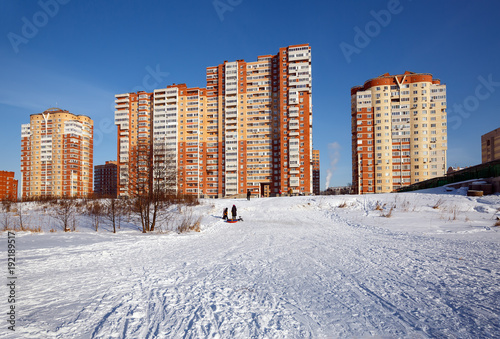 New residential neighborhood on the bank of the river Pekhorka in winter. City of Balashikha, Moscow region, Russia.