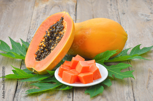 papaya on wooden background