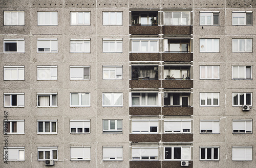 Typical old panel apartment with a lot of windows from Budapest, Hungary, as a texture or for background, real photo