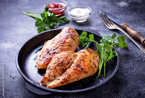 Grilled chicken breast or fillet on iron pan