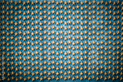 Golden stars on the blue background, symbol of American freedom