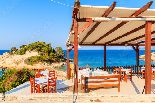 Greek tavern on beach in Kokkari town, Samos island, Greece
