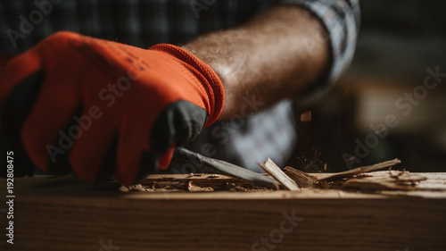 carpenter works with manual and electric equipment