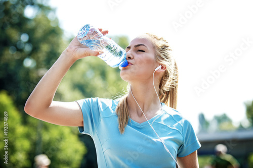 Woman is drinking water