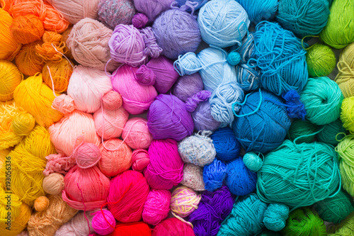 Colored balls of yarn. View from above. Rainbow colors. All colors. Yarn for knitting. Skeins of yarn.