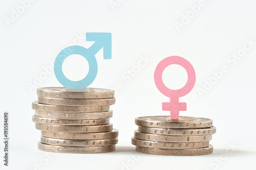 Male and female symbols on piles of coins - Gender pay equality concept