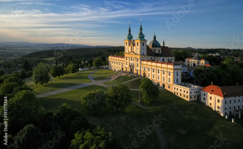 Aerial view on Pilgrimage Church of the Visitation of the Virgin Mary - pilgrimage site of European significance "The Holy Hill" from-afar visible silhouette of basilica minor over moravian landscape.