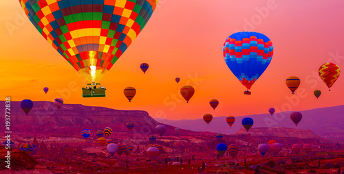 Many Hot air balloon flying over rocks formations valley panorama spectacular Cappadocia