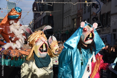 A colourful parade of carnival masks in the city of Basel, Switzerland, revives a centuries old tradition of masked and costumed performances.