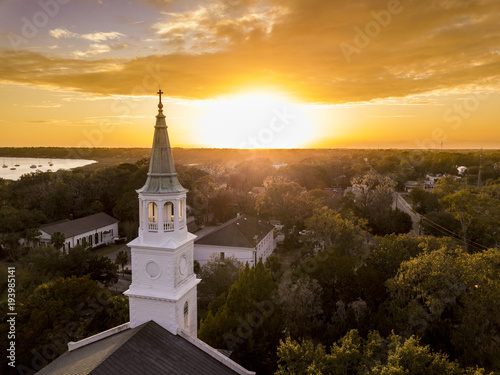 Aerial view of historic church steeple and sunset in Beaufort, South Carolina.