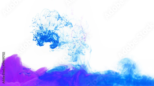 Stains of colorful acrylic ink in water.