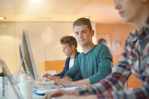 Group of students in class working on computers