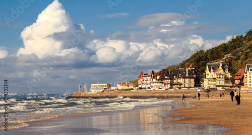 TROUVILLE, FRANCE. Unidentified tourists on the coast of Trouville, Normandy, France.