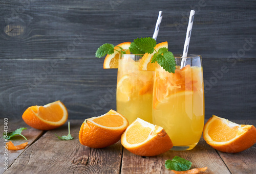 Сold orange lemonade on a wooden table