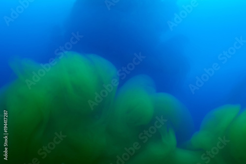 Mixed blue and green liquid background