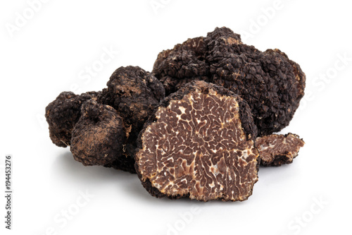Black truffles and oak leaves.