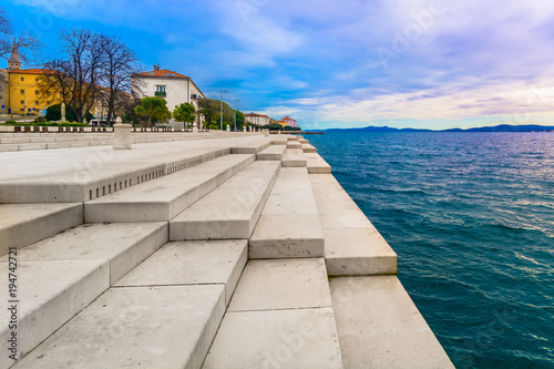 Zadar coastline Sea Organ. / Scenic view at coastal town Zadar and famous landmark on city promenade, Sea Organ, Croatia Europe.