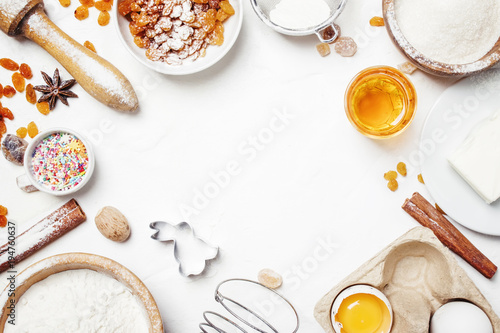Easter baking ingredients, white food background, top view