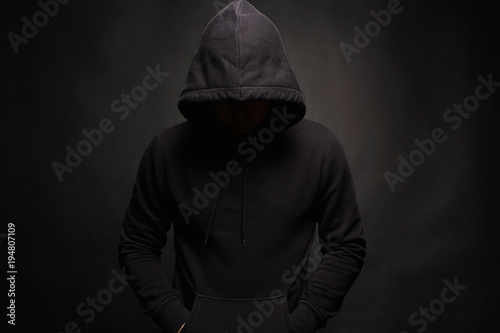 Man in Hood. Dark figure