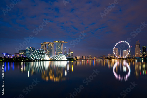 Singapore business district skyline in night at Marina Bay, Singapore. Asia