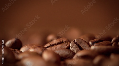 macro of coffee beans in studioshoot on brown