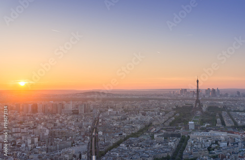 Top view of the Eiffel tower looking from Montparnasse tower with sunset