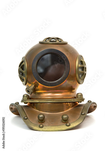 Old brass diving mask isolated on white