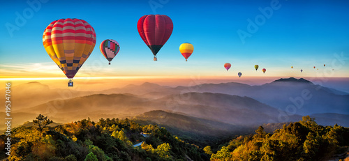 Colorful hot air balloons flying over mountain at Dot Inthanon in Chiang Mai, Thailand..