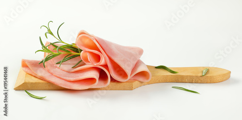 thin slices of ham and rosemary