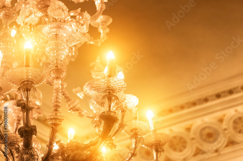 Part of the beautiful luminous crystal chandelier, close-up
