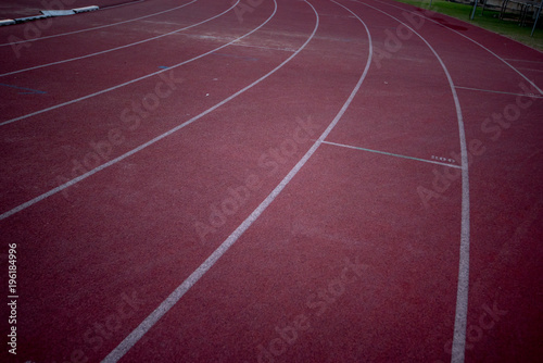 Red running track at night