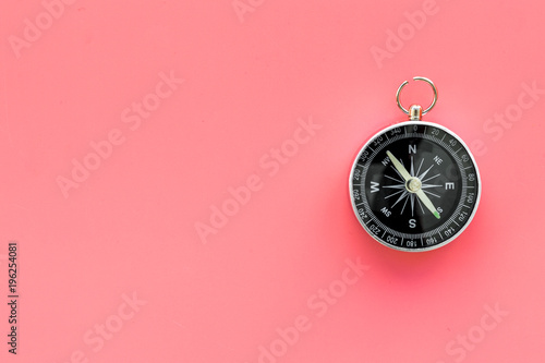 Direction concept with compass on pink background top view mockup