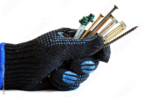 Male hand in black working glove holding the metal roofing self tapping screws. White background