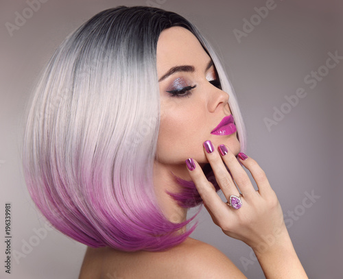 Ombre bob hair woman. Glitter Makeup. Manicure nails. Beauty Portrait of blond model with short shiny hairstyle. Concept Coloring Hair. Fashion jewelry