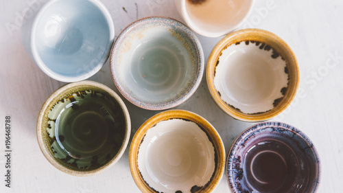 ceramic bowls for drinks close-up. Ceramic ware made by own hands