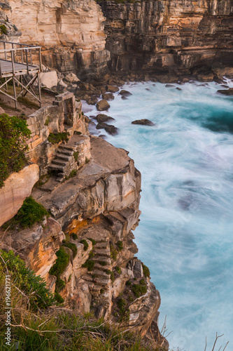 Steep cliff stairs into the ocean at Diamond Bay, Sydney, AU