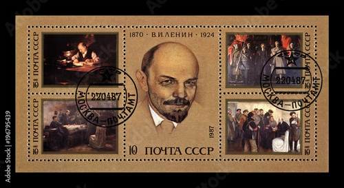 Vladimir Uliyanov (Lenin, 1870-1924), famous politician proletariat leader, circa 1987. canceled vintage postal stamp of USSR isolated on black background. 