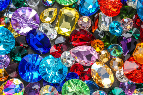 Various colorful precious stones for jewellery as background