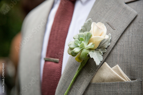 Groom on Wedding Wire with White Rose Boutonniere